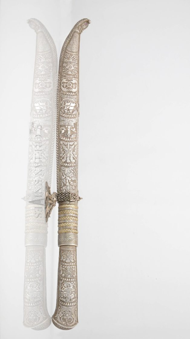 Traditional carved Cretan knife with carved silver case